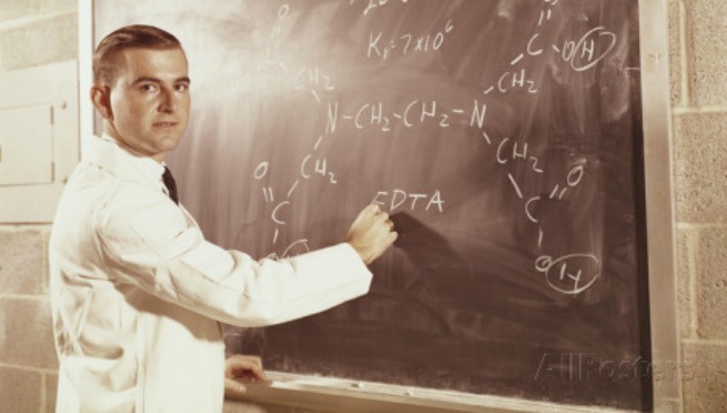 h-armstrong-roberts-science-professor-writing-a-formula-for-chelating-agent-on-chalkboard-654x372
