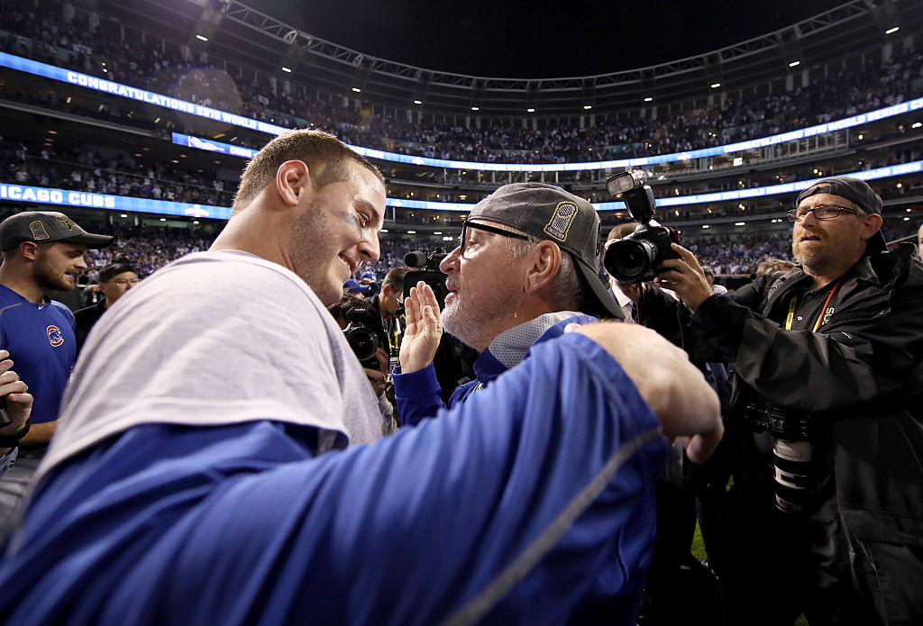 CLEVELAND, OH - NOVEMBER 02: Anthony Rizzo #44 celebrates with manager Joe Maddon of the Chicago Cubs after defeating the Cleveland Indians 8-7 in Game Seven of the 2016 World Series at Progressive Field on November 2, 2016 in Cleveland, Ohio. The Cubs win their first World Series in 108 years. (Photo by Ezra Shaw/Getty Images)